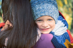 Child hugging mother