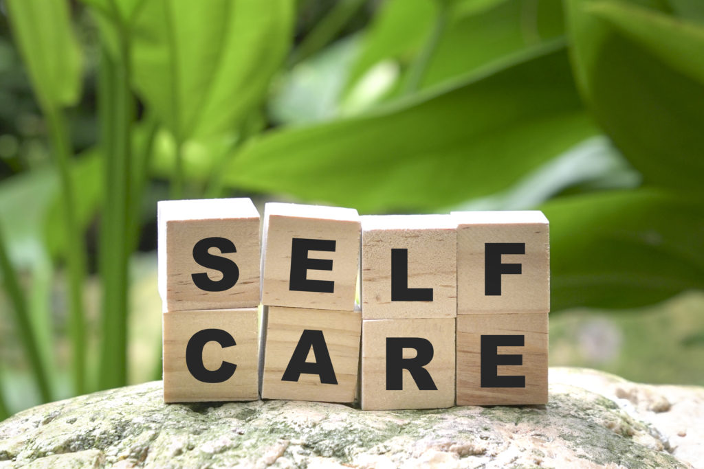 Self care word on wood blocks