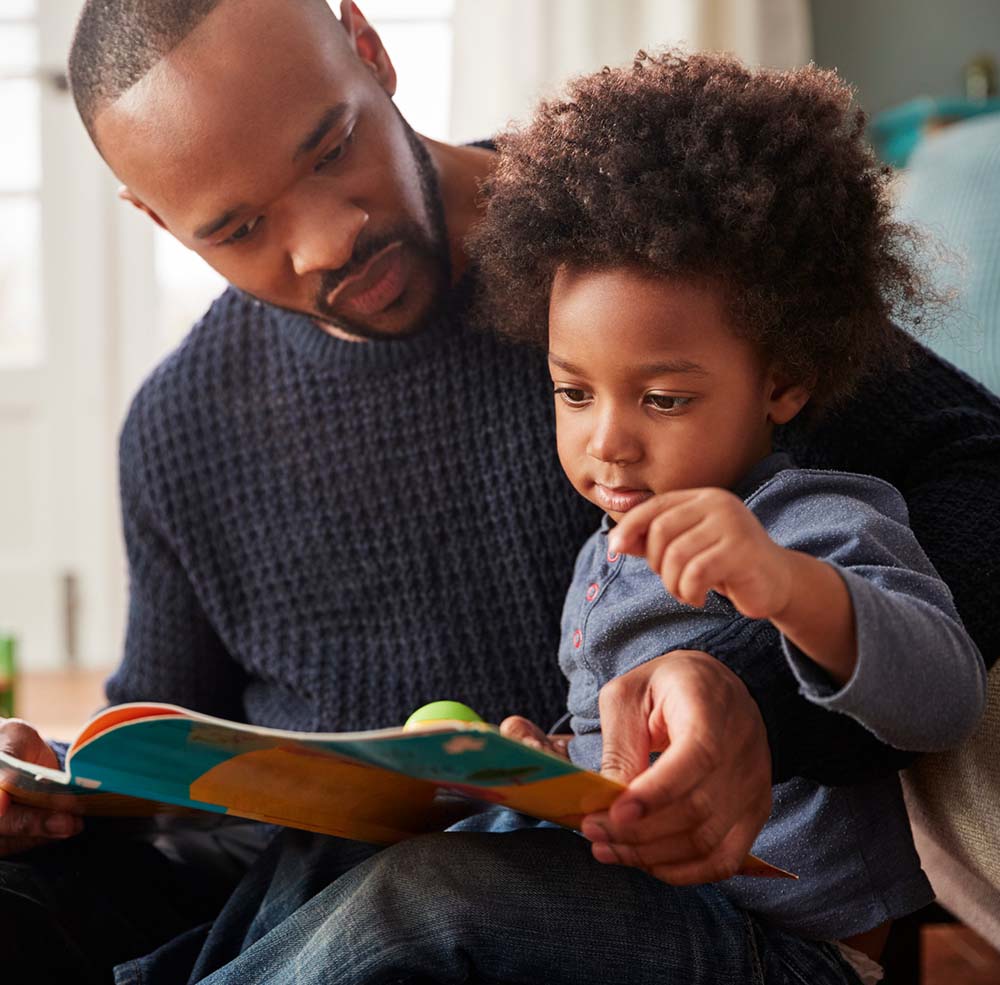 father and son reading